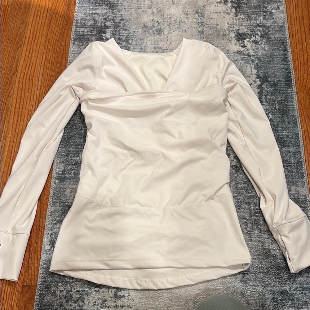 Lalabu white long sleeve top for baby wearing
